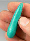 Blue clay being shaped